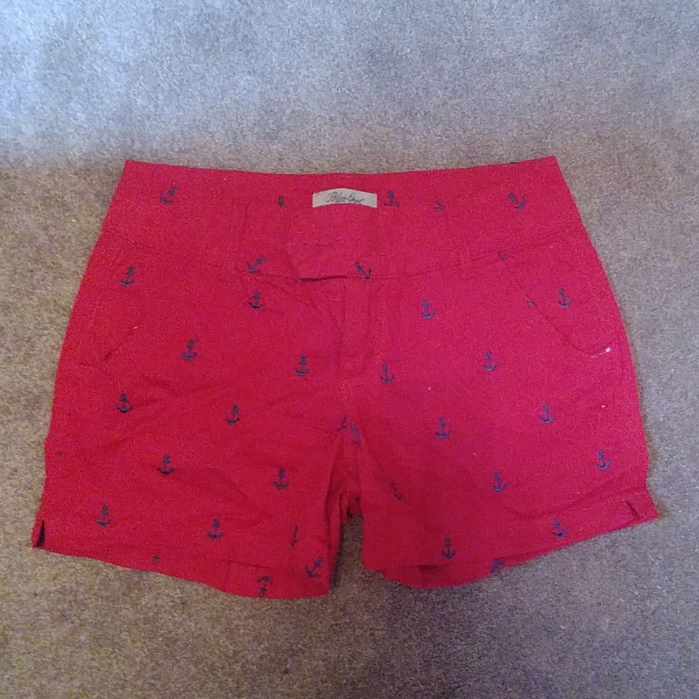 Red shorts with navy anchors